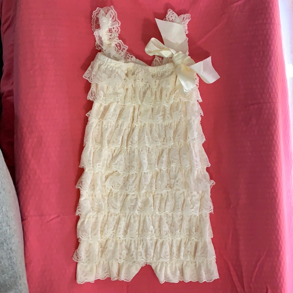 Infant lace romper in ivory